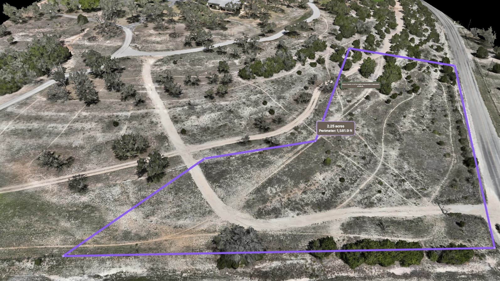 Aerial map of a construction site with area and volume measurements marked