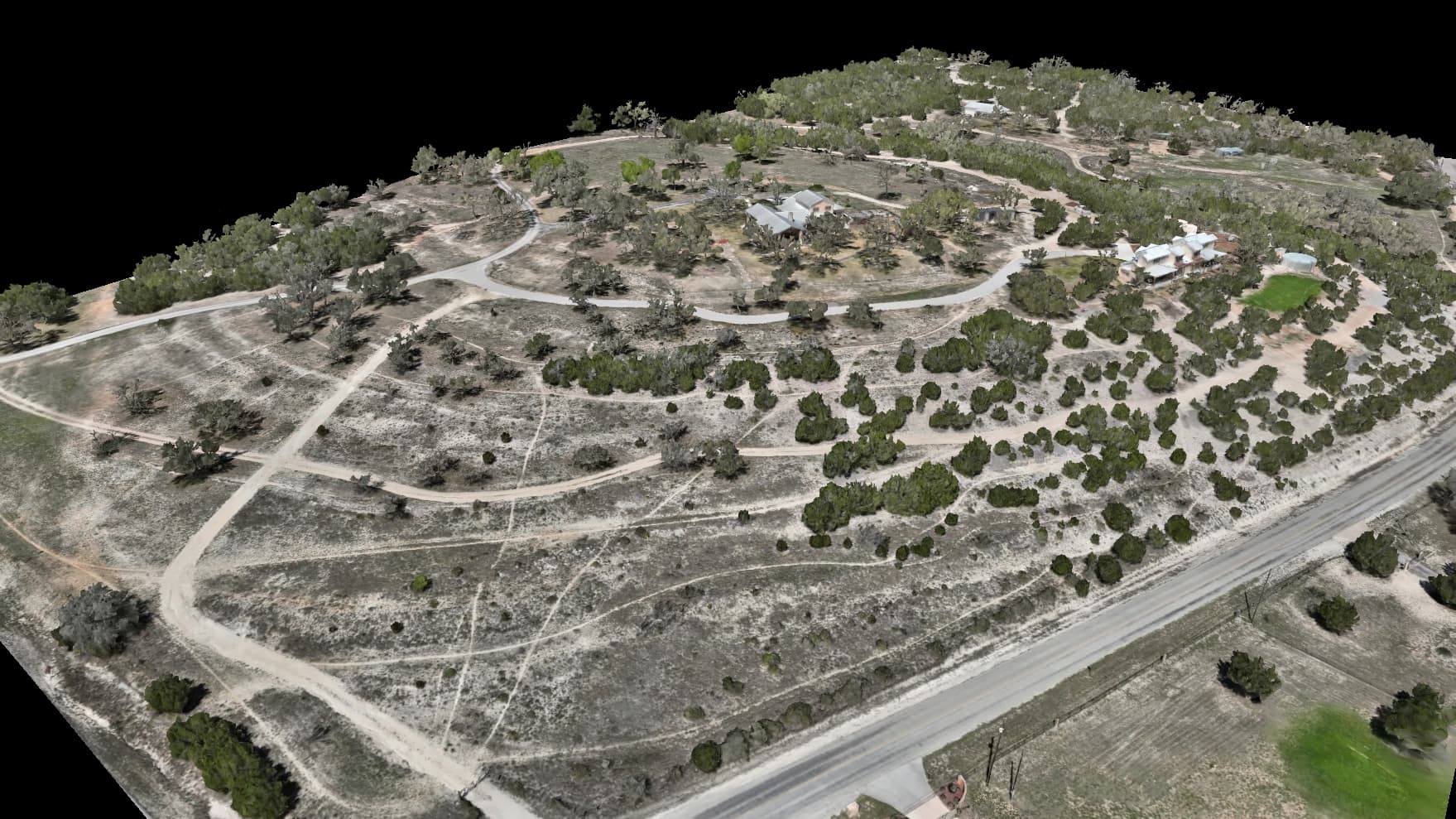Photoreal 3D model of a Hill Country ranch captured from the air
